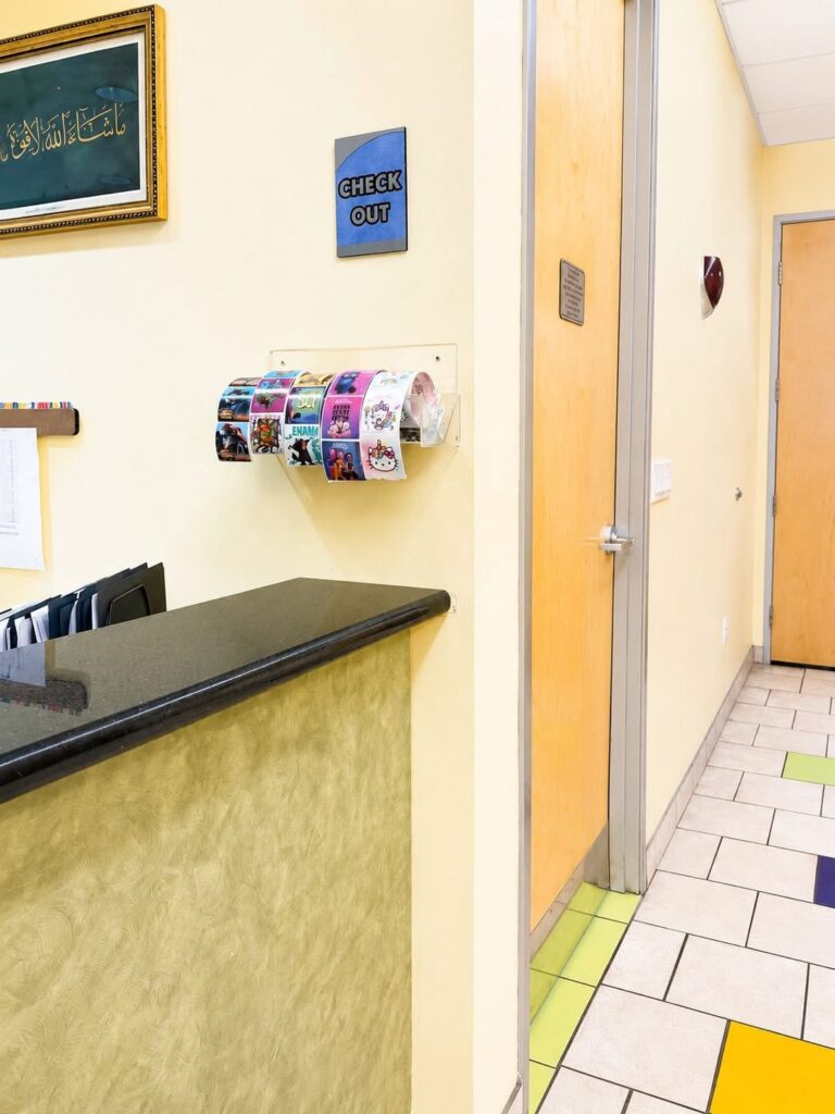 The check-out desk, with sticker rolls for kids