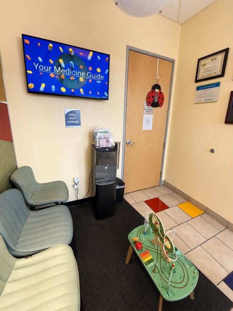 Waiting room seats beside a play table